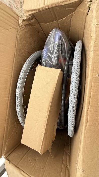 Инвалидное кресло.