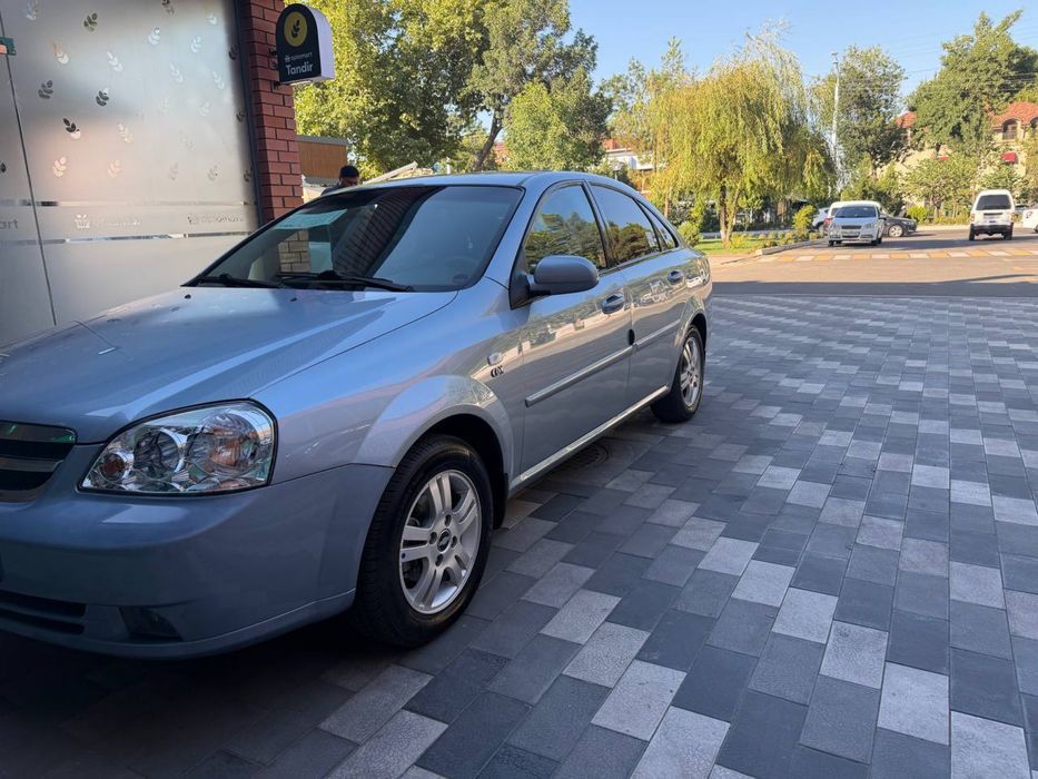 Lasetti 2012 yil 1.6 mator metan gaz