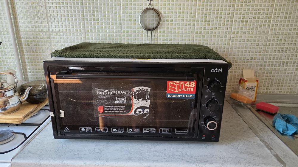 Продам духовку artel 48литров