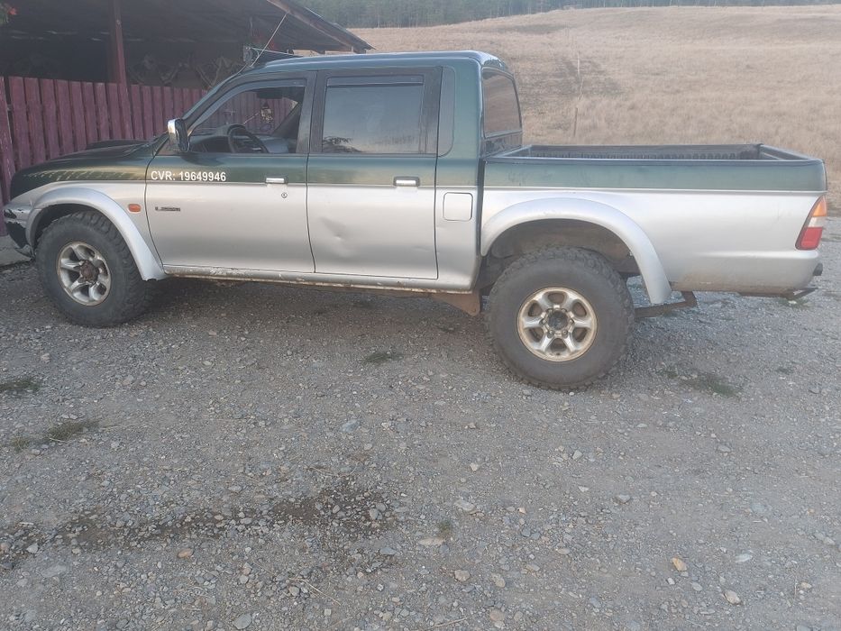 Mitubisi l 200 patru  ori patru