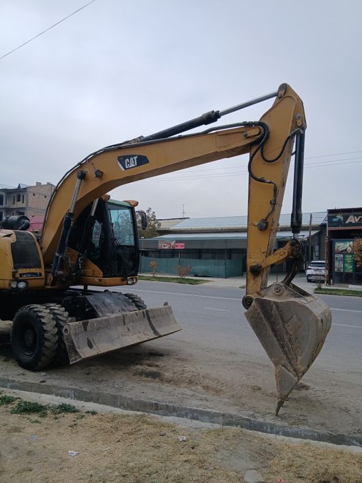 CAT M313D экскаватор сотилади