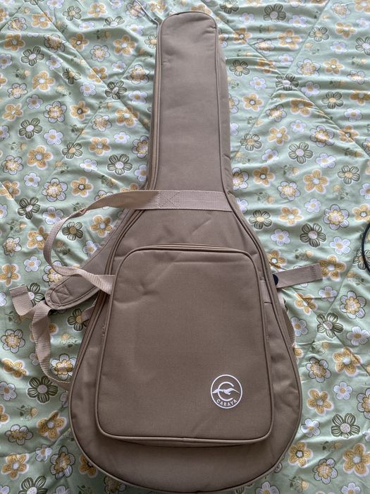 продам срочно аккустическую гитара от Caraya