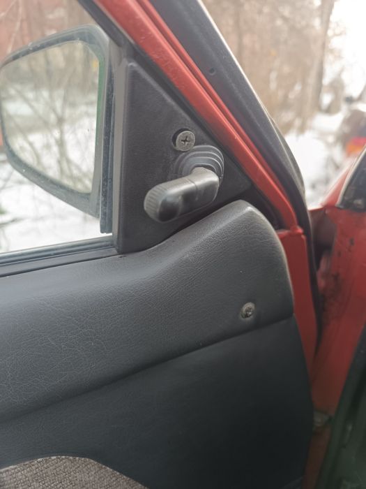 Боковое левое зеркало Mazda 323