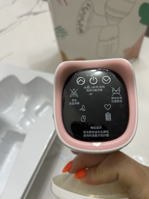 Электрический молокоотсос