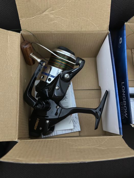 Okuma custom black + longbow