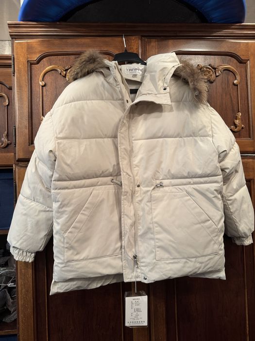 Продам женский пуховик