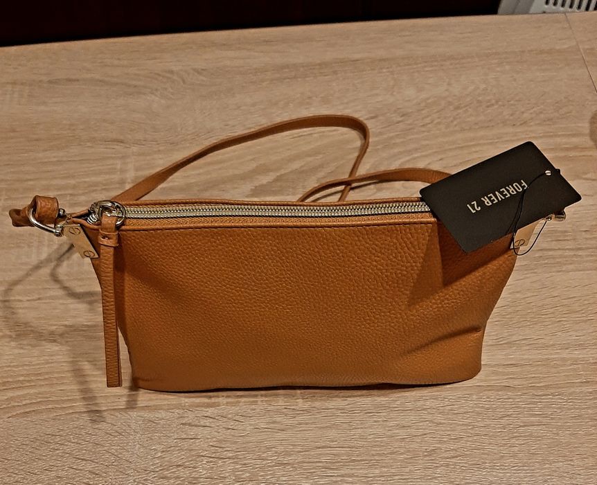 Оригинални  свещници ,-нови и оригинална ,нова чантичка