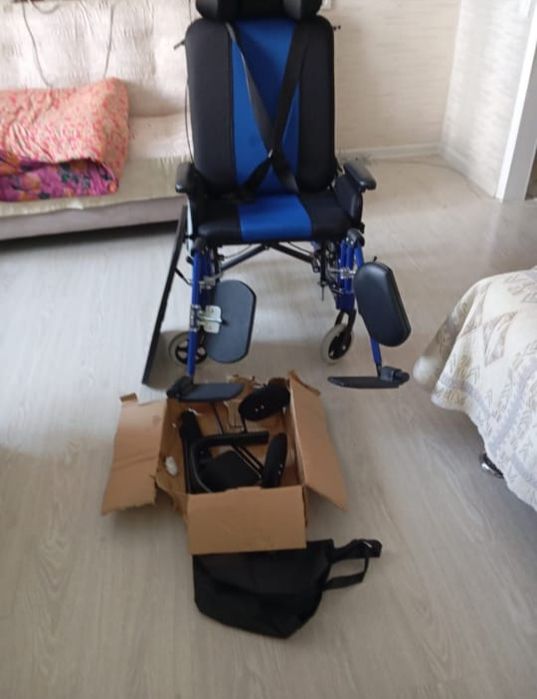 Многофункциональная инвалидная коляска