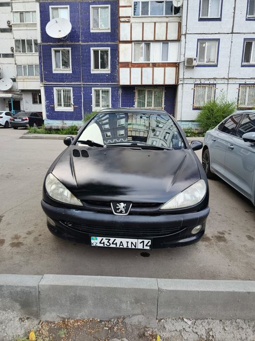 Машина Peugeot 206
