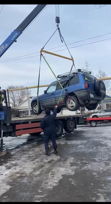 Грузовой эвакуатор-манипулятор