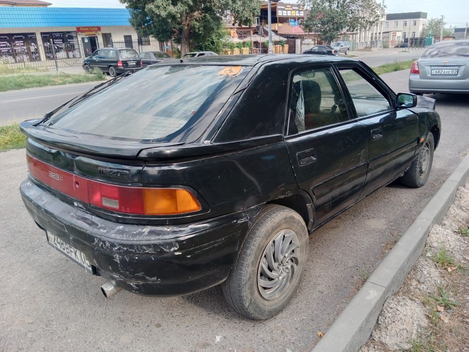 Продам машину Мазда 323