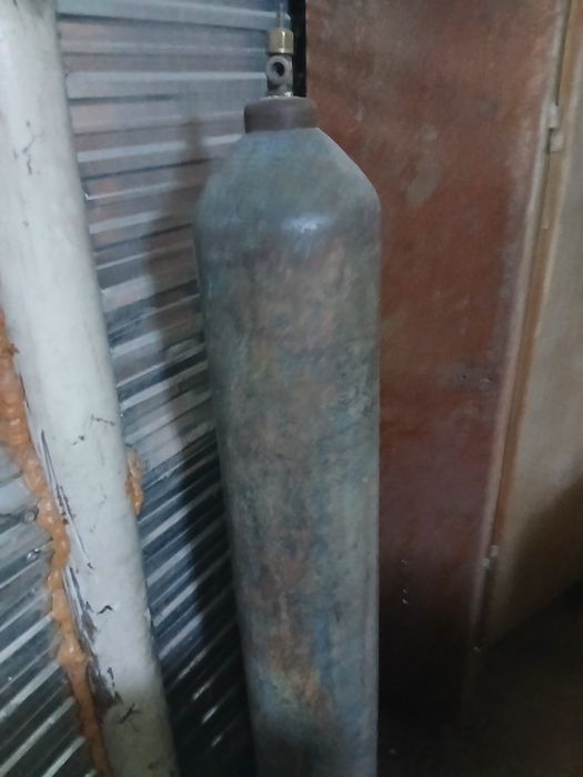 Кислородный балон . Кислород