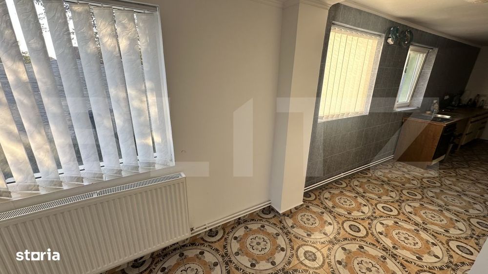 Casa renovata - situata central in satul Aurel Vlaicu