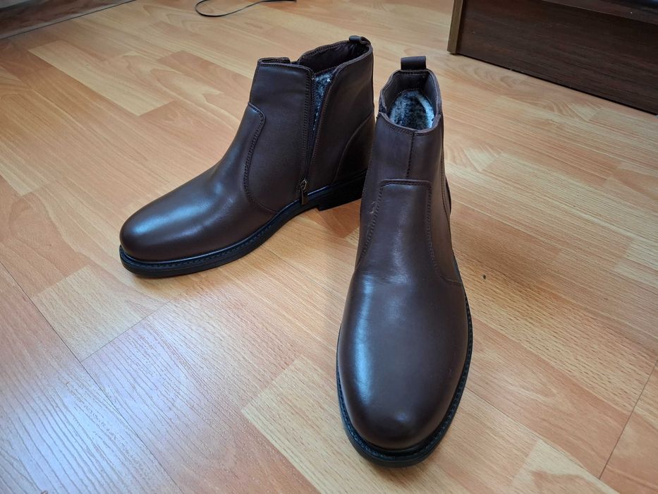 Продам новые сапоги мужские