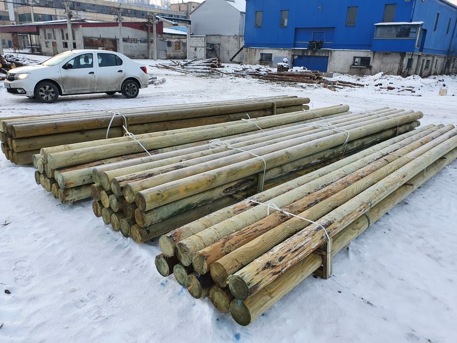 Stalpi pentru linii aeriene de cablu din lemn calibrat si tratat