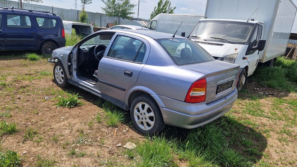 Opel astra G usi capota cutie viteze usa bara portbagaj hayon stopuri stop aripa aripi Scaune roti punte fuzeta amortizor motor  armatura alternator