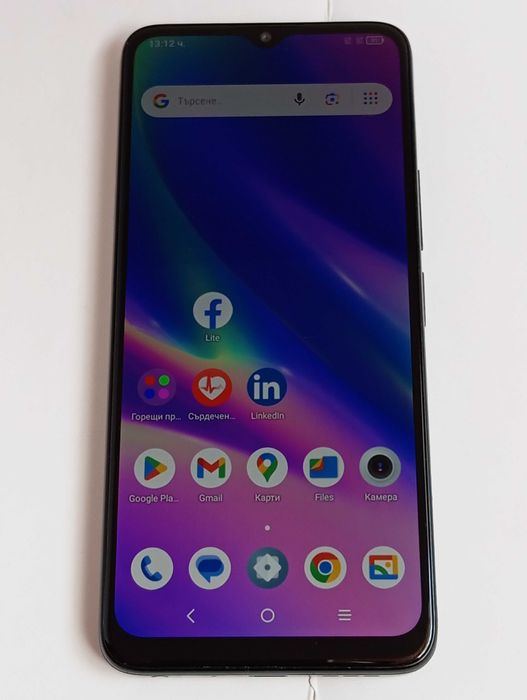 Телефон TCL 405 с протектори и зарядно като нов