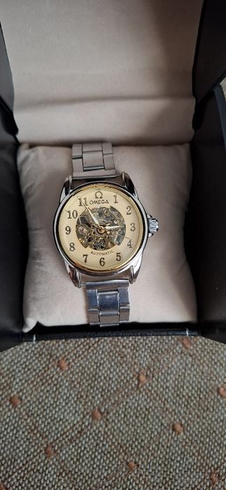 Часы омега stainless