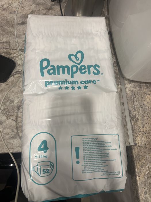 Памперс premium care 4