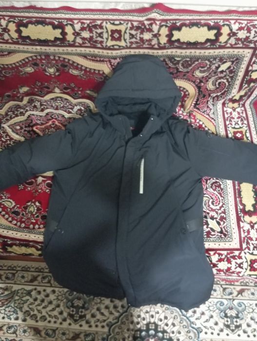 Продам пуховик в отличном состояние