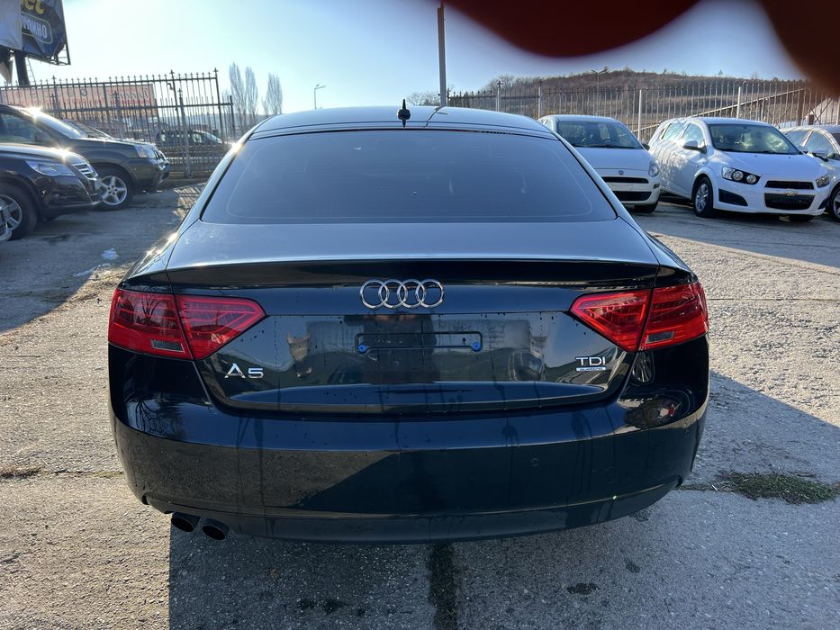 Audi A5 2.0TDI spotrback Quattro .