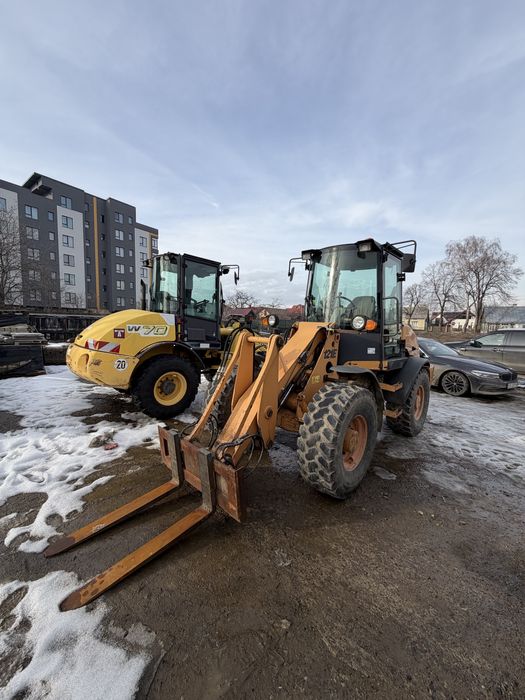 Incarcator frontal Case 121E