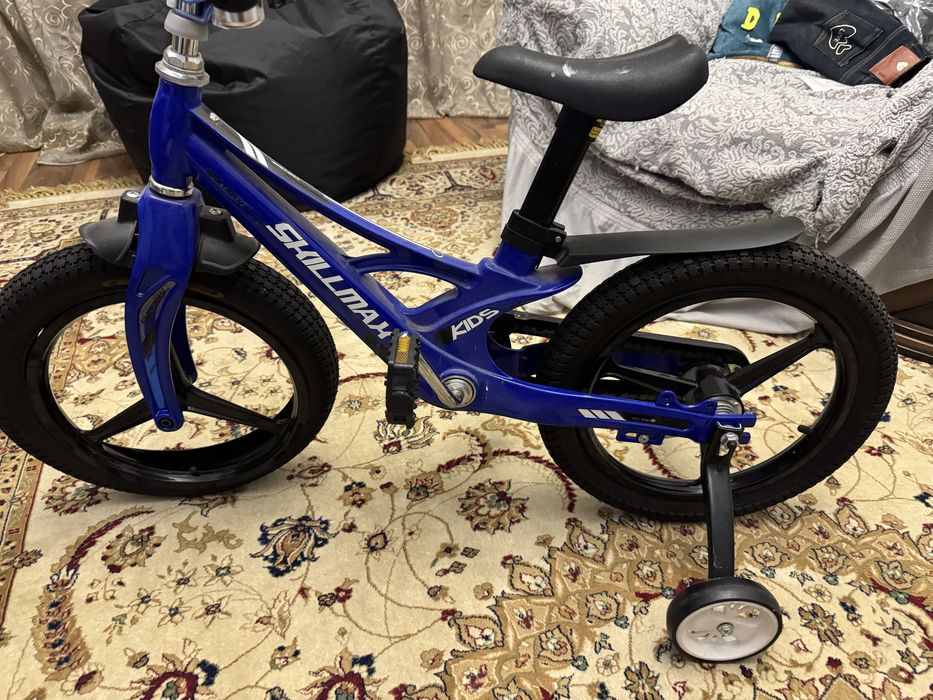 Велосипед четырех колесный