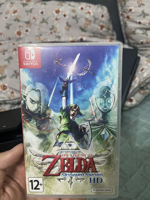 Нинтендо Свитч с игрой Zelda с причтавкой