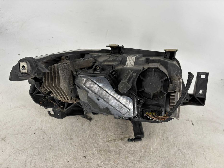 Far stanga Bmw seria 3 E90 an 2009