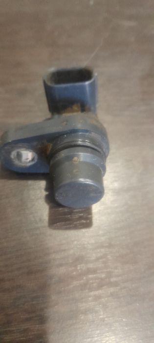 Датчик положения колленвала мазда3 2006год