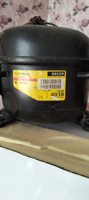 Компрессор холодильника.