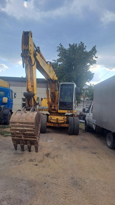 Продам колесный экскаватор Libherr A902-L