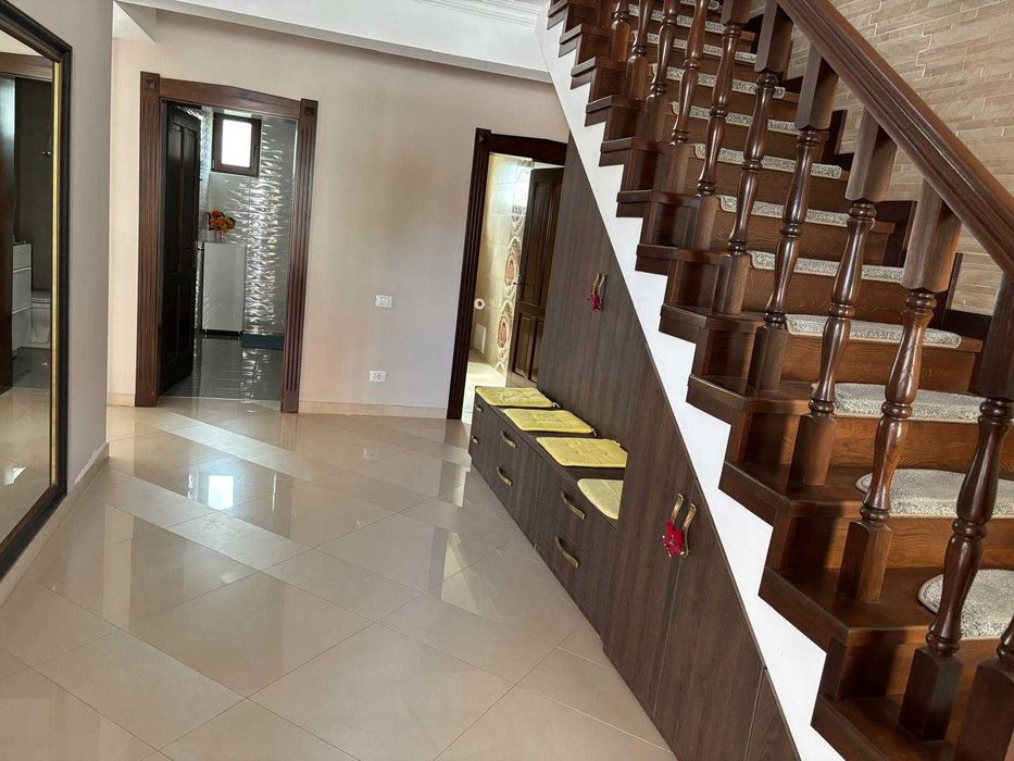 Vând casă P+M  în Sânmartin + un teren de 542 m2
