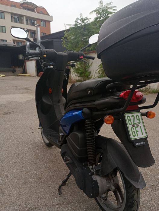 Peugeot скутер ..
