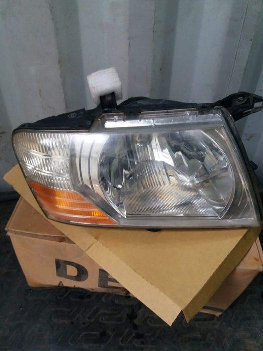 Фары Mitsubishi Pajero