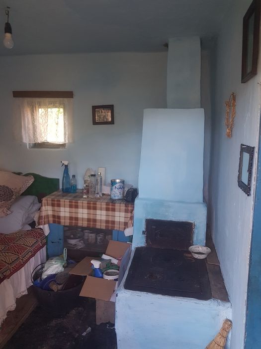 Teren + casa + panouri 7 kW + baterie, zona liniștită