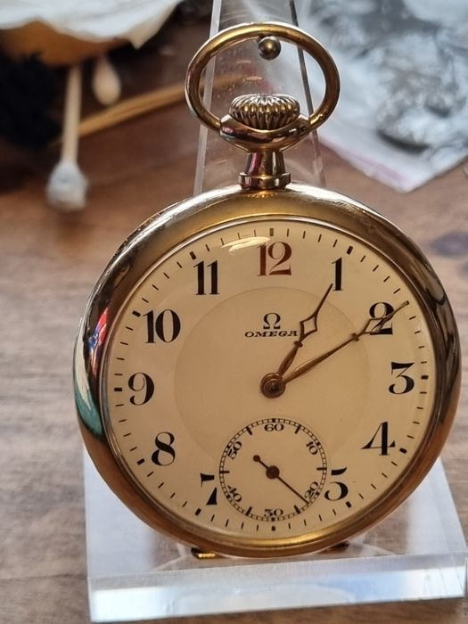 Omega златен  джобен 14к