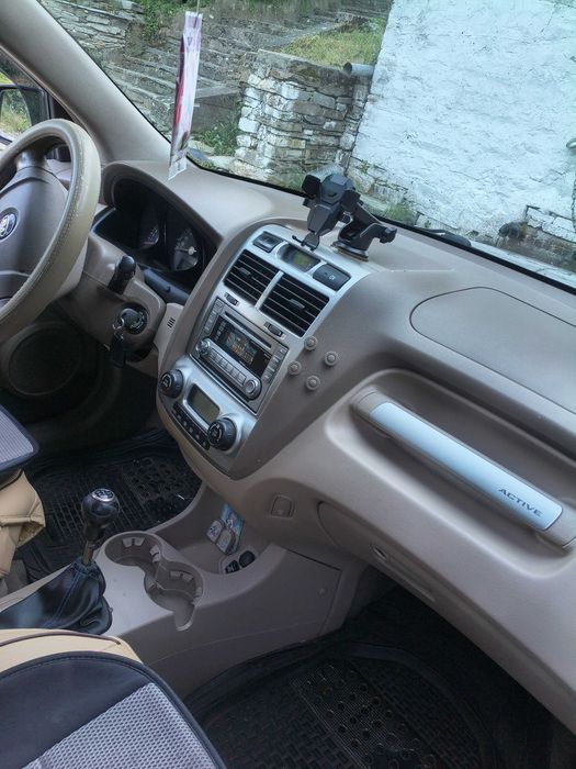 автомобил KiA Sportige