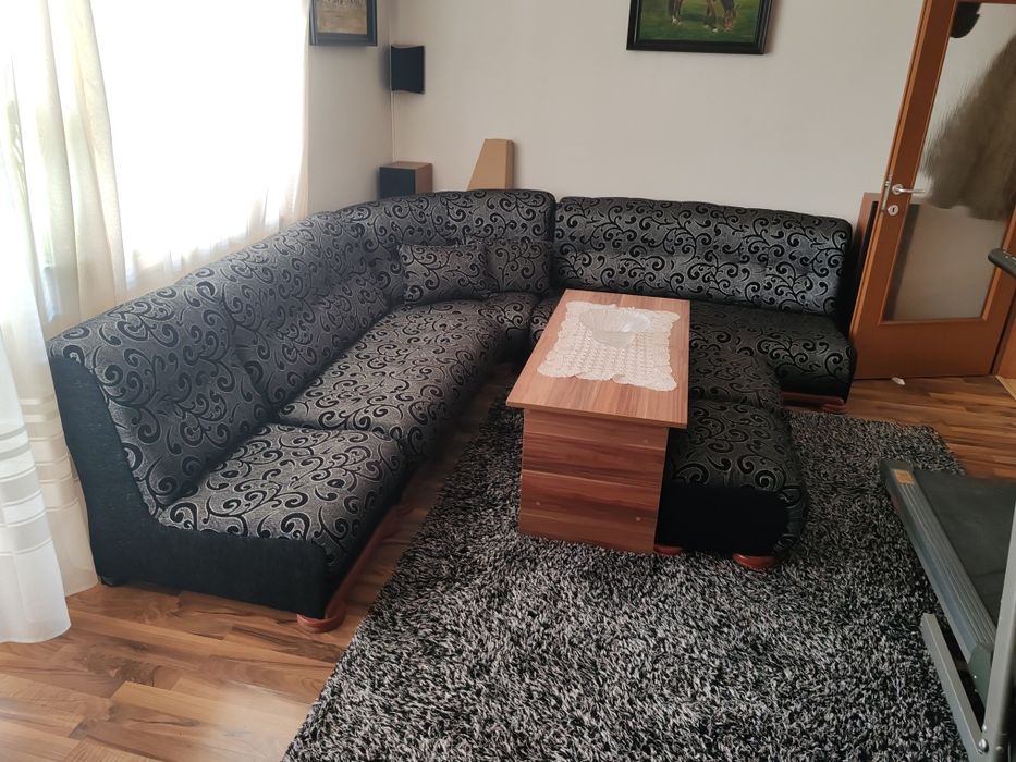 Ъглов диван за хол, фотьойл и две табуретки.