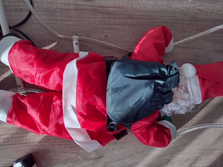 Дядо Коледа на стълбичка