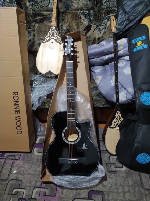 Новая акустическая гитара