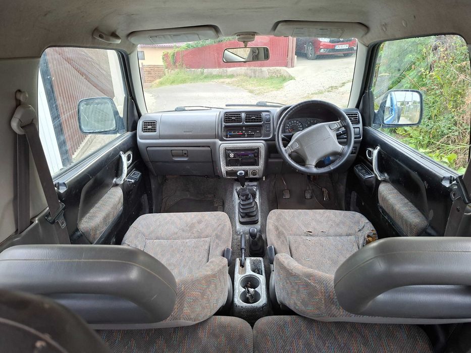 Suzuki Jimny 1.3 benzină 4x4