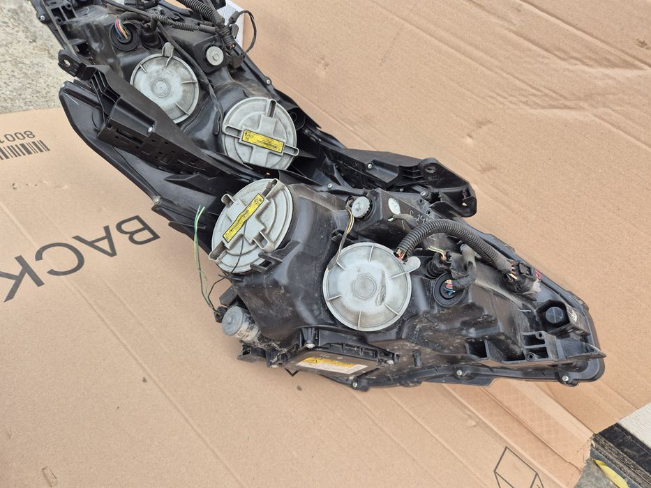 Faruri Originale Xenon Toyota Avensis T27 NFL 2009-2012. Volan stinga.