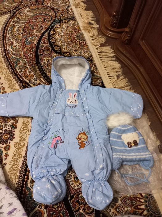Продам комбинизон с шапочкой и мех.наушники