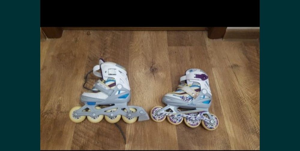 Роликовые коньки