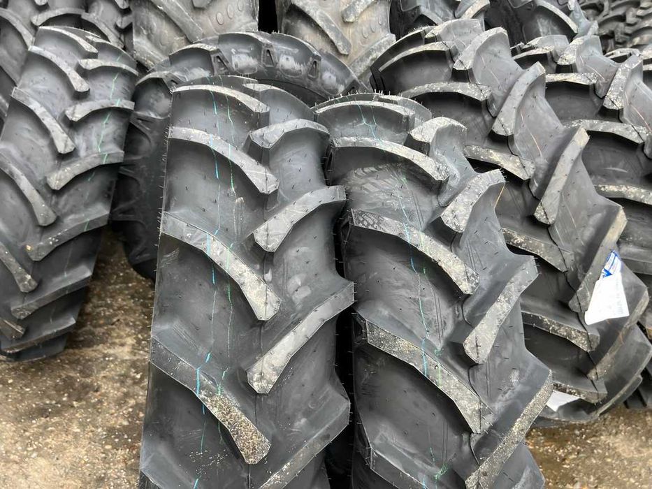 Anvelope noi 12.4-24 cu 8 pliuri pentru tractor John Deere cu garantie