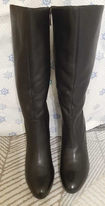 Продам новые сапоги