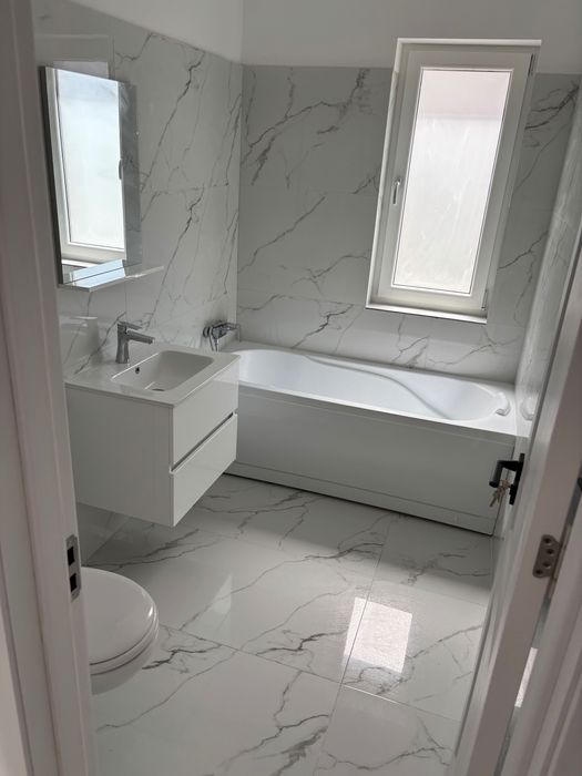 Proprietar-Apartament nou cu gradina