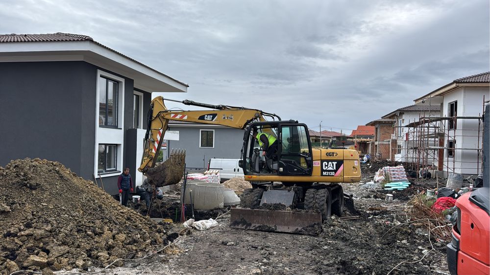 Inchiriez excavator pneuri