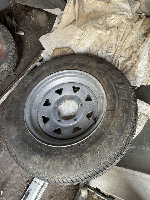 Ось с колёсами для прицепа